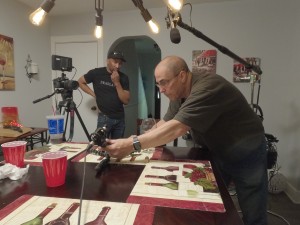 Sound mixer setting up a plant mic